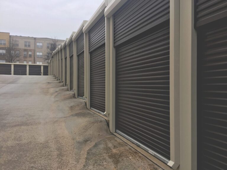 Door Monitoring, Storage units with security roll-up doors, secure self-storage facility for personal or business needs.