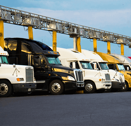 Fleet_BLE Fleet of commercial trucks equipped with advanced GPS tracking technology.